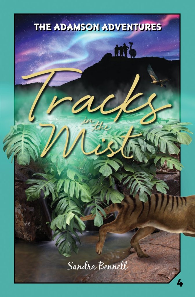 A bush scene with green bushes, rocks and an outlook under pink, blue and purple lights with the back of a striped animal at the bottom surrounded by a teal border. White text says the Adamson Adventures at the top, and cursive text in the middle says Tracks in the Mist by Sandra Bennett with a 4 in the lower right corner. 