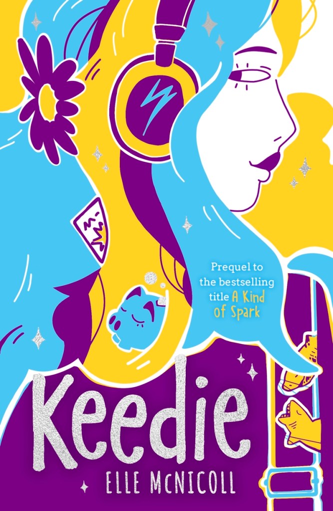 A girl in blue, white, yellow, and purple with silver text that says Keedie by Elle McNicoll. The girl has headphones on her head and a flower, with a piggy bank in her hair. 