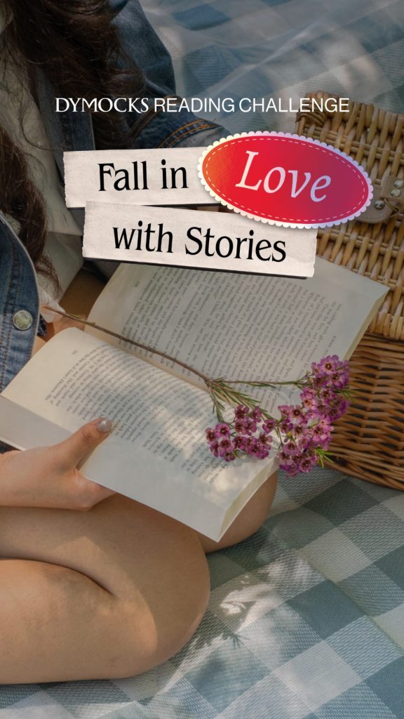 An open book with a flower in the middle in the lap of a girl sitting on a white and blue picnic rug next to a picnic basket. White text says Dymocks Reading Challenge. Fall in Love with Stories is on white and red panels in black and white text. 