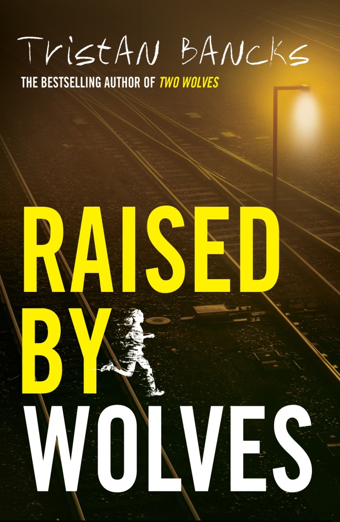 Raised by Wolves

Train tracks under yellowish lights. The image is behind yellow and white text that says Raised by Wolves by Tristan Bancks.
