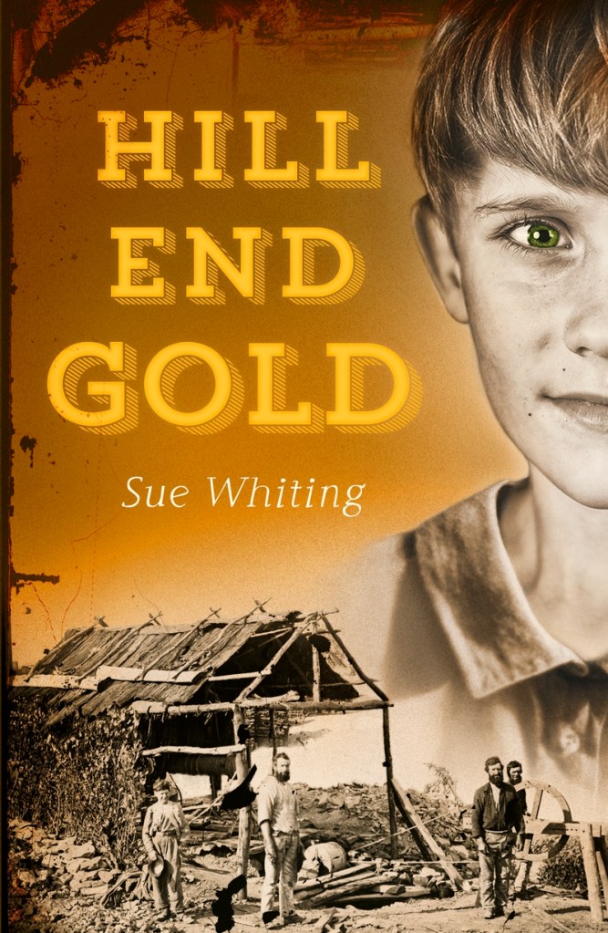 Hill End Gold
A sepia picture of a boy and a gold rush camp against a gold background. Yellow text reads Hill End Gold and white text says Sue Whiting.