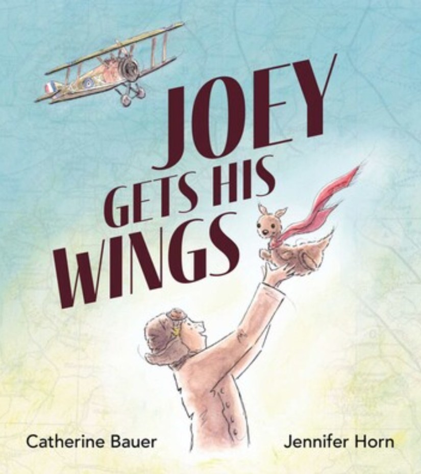 
Joey Gets His Wings 

A boy holding a toy kangaroo against a blue sky with a plane flying overhead. The text is between the plane and the boy. Joey Gets his Wings by Catherine Bauer and Jennifer Horn.
